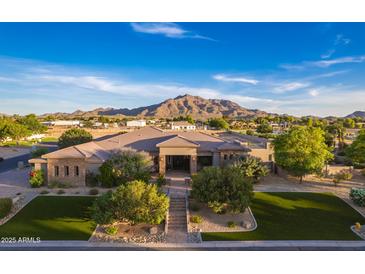 Stunning single-story home with professional landscaping, tile roof, and mountain views at 7456 S Brighton --, Queen Creek, AZ 85142