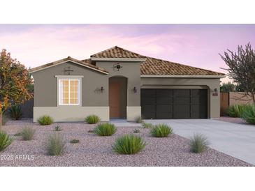 Single-story home with a terracotta tile roof and a two-car garage at 10206 S Bickwell Trl, Apache Junction, AZ 85120