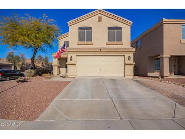 Two-story house with a large driveway and landscaped front yard at 11830 W Avenida Del Sol --, Sun City, AZ 85373