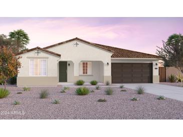 One-story home with dark brown garage door and desert landscaping at 1226 W J Waltz Way, Apache Junction, AZ 85120