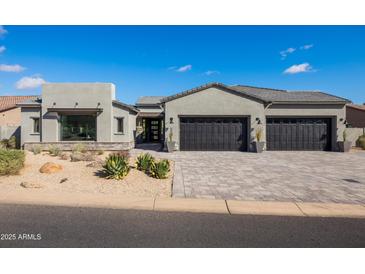 Stunning modern home with two-car garage and desert landscaping at 13238 E Ranch Gate Rd, Scottsdale, AZ 85255