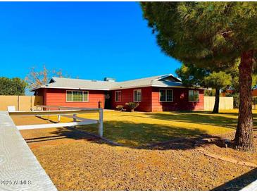 Ranch style home with spacious yard and mature trees at 50530 W Mockingbird Ln, Maricopa, AZ 85139