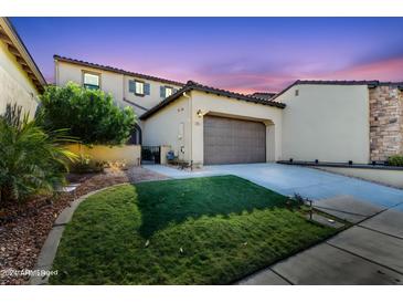 Two-story house with attached garage and landscaped front yard at 4700 S Fulton Ranch Blvd # 62, Chandler, AZ 85248