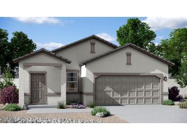 One-story home with two-car garage and desert landscaping at 9745 W Agora Ln, Tolleson, AZ 85353