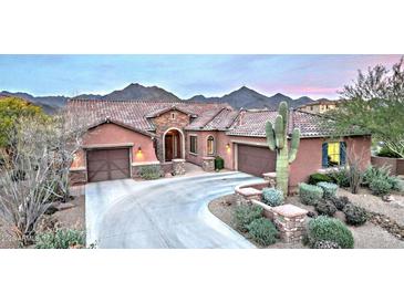 Stunning desert home with terracotta roof and stone accents at 17353 N 99Th St, Scottsdale, AZ 85255