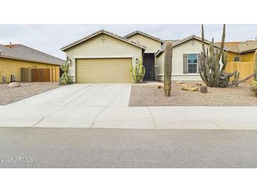 Charming single-story home featuring desert landscaping and a two-car garage at 2022 W Briana Way, San Tan Valley, AZ 85144