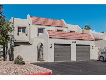 Front view of townhome with two car garage at 2524 S El Paradiso -- # 121, Mesa, AZ 85202