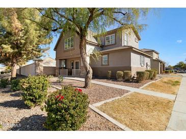 Two-story house with landscaping and a walkway at 2212 E Sunland Ave, Phoenix, AZ 85040