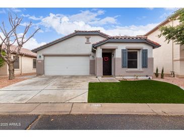 Single-story home with attached garage and landscaped lawn at 3645 E Sheffield Rd, Gilbert, AZ 85296