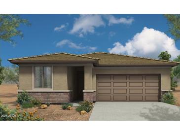 Single-story home with a two-car garage and desert landscaping at 18149 W Cielo Grande Ave, Surprise, AZ 85387