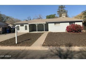 Ranch-style home with carport and well-maintained landscaping at 510 W 14Th St, Tempe, AZ 85281