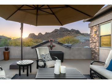 Relaxing rooftop patio boasts mountain views and comfortable seating at 10196 E Legend Trl, Gold Canyon, AZ 85118