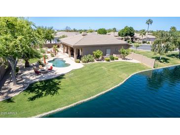 Luxury home with pool and lake views at 1653 W Zion Pl, Chandler, AZ 85248