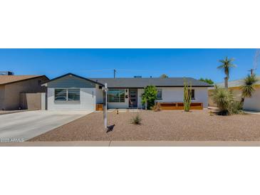 Charming single-story home with desert landscaping and modern color palette at 8024 E Hubbell St, Scottsdale, AZ 85257