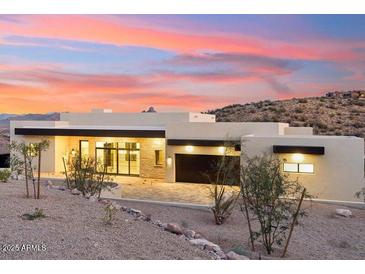 Modern home exterior with clean lines and desert landscaping at 15609 E Palatial Estates Dr, Fountain Hills, AZ 85268