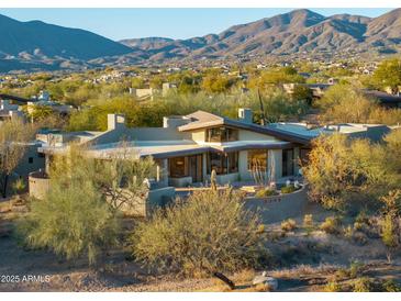 Luxury home with mountain views and desert landscaping at 10531 E Fernwood Ln, Scottsdale, AZ 85262