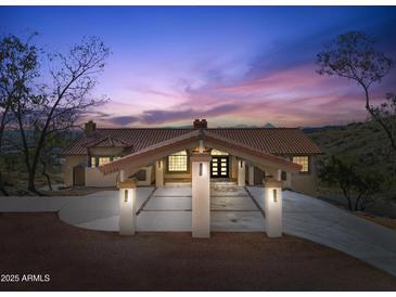 Front view of house with a porte cochere entrance at 37020 N 31St Ave, Phoenix, AZ 85086