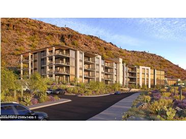 Luxury apartment building with mountain backdrop at 5000 N Camelback Ridge Dr # 107, Scottsdale, AZ 85251
