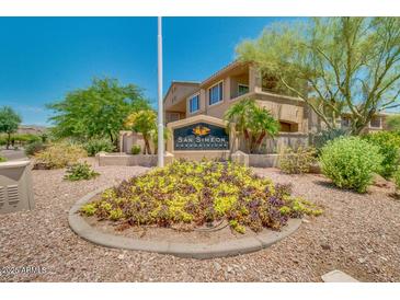 San Simeon Condominiums entrance with landscaping at 16013 S Desert Foothills Pkwy # 2095, Phoenix, AZ 85048