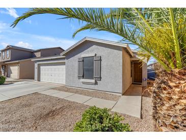 Charming one-story home with a two-car garage at 40440 N High Meadows Dr, San Tan Valley, AZ 85140