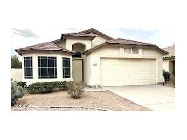 Charming single-story home featuring desert landscaping, a two-car garage, and a light-colored facade at 4383 E Coal St, San Tan Valley, AZ 85143