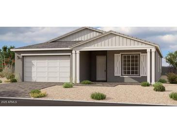 Single-story home with white garage door and gray exterior at 11438 E Utopia Ave, Mesa, AZ 85212