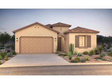 One-story home with tile roof, attached garage, and desert landscaping at 18180 E Tiffany Dr, Queen Creek, AZ 85142