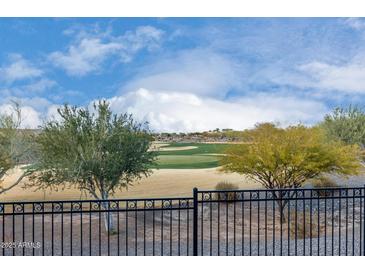 View of backyard with golf course views at 26686 W Piute Ave, Buckeye, AZ 85396