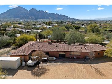 Aerial view of single-story home with mountain views at 4510 E Pepper Tree Ln, Paradise Valley, AZ 85253