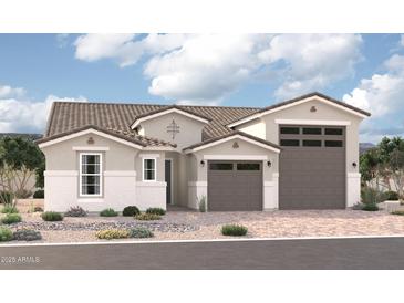 New two-story home with a two-car garage and desert landscaping at 2242 S 182Nd Dr, Goodyear, AZ 85338