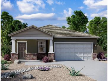 One-story house with two-car garage, stone accents, and landscaping at 38153 N Stallion St, San Tan Valley, AZ 85140