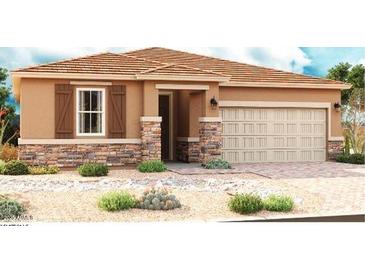 Tan two-story house with brown shutters, stone accents, and a two-car garage at 2757 N 195Th Dr, Buckeye, AZ 85396