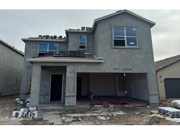 New construction two-story home featuring a spacious garage and modern window design at 4173 E Kolin Ln, San Tan Valley, AZ 85143