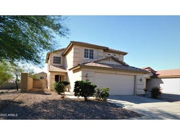 Two-story house with attached garage and landscaped front yard at 21963 W Gardenia Dr, Buckeye, AZ 85326