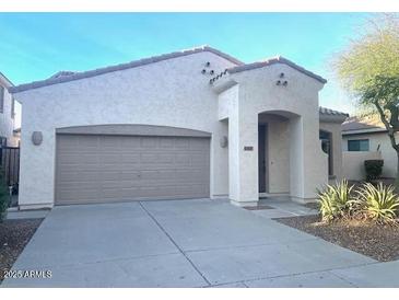Charming single-story home with stucco and desert landscaping at 4286 E Buckboard Rd, Gilbert, AZ 85297