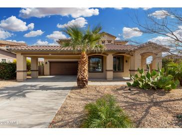 Inviting single-Gathering home with a well-maintained front yard and two car garage at 15357 W Post Cir, Surprise, AZ 85374