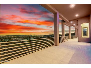 Spacious balcony with desert views and sturdy railing, perfect for enjoying sunsets at 36923 N 31St Ave, Phoenix, AZ 85086