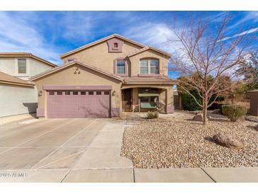 Charming two-story home with a well-maintained yard and inviting curb appeal in a quiet neighborhood at 22905 N 19Th Way, Phoenix, AZ 85024