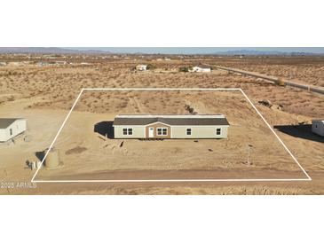 An aerial view shows the placement of the manufactured home and the dimensions of the property at 2723 S 357Th Dr, Tonopah, AZ 85354