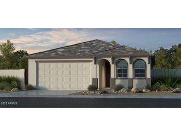 Charming single-Gathering home with a two-car garage and well-manicured landscaping at 17566 W Georgia Ave, Litchfield Park, AZ 85340