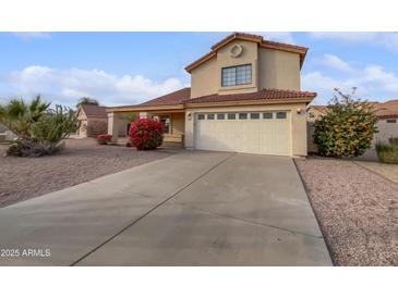 Charming two-story home with a spacious driveway and well-maintained landscaping at 3732 E South Fork Dr, Phoenix, AZ 85044