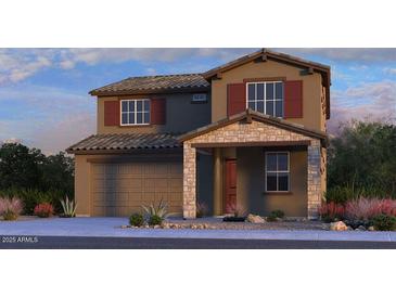 Two-story home featuring a stone porch, two-car garage, and neutral color palette with red shutters at 16792 W Hope Dr, Surprise, AZ 85388