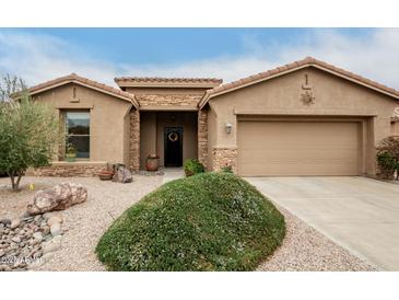 Charming home featuring a desert landscape, stone accents, and a welcoming entryway at 24824 S Golfview Dr, Sun Lakes, AZ 85248