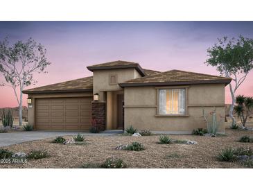 Beautiful single story home with two-car garage, desert landscaping and a stacked stone front entry at 42920 W Palo Abeto Dr, Maricopa, AZ 85138
