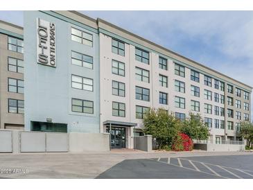Stylish building with a modern design, lush landscaping, and street-level access in an urban setting at 535 W Thomas Rd # 211, Phoenix, AZ 85013