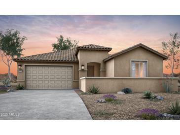 Charming single-story home featuring a desert landscape, inviting entryway, and two car garage at 42855 W Palo Abeto Dr, Maricopa, AZ 85138