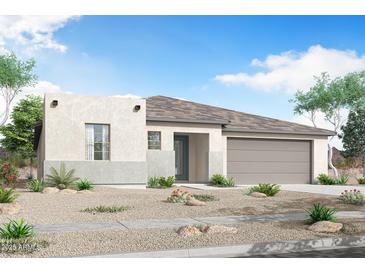 Charming single-story home with desert landscaping and a neutral color palette at 1307 S 185Th Dr, Goodyear, AZ 85338