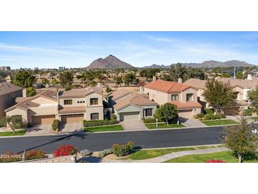 Charming single-story home with desert landscaping and mountain views at 8100 E Camelback Rd # 43, Scottsdale, AZ 85251