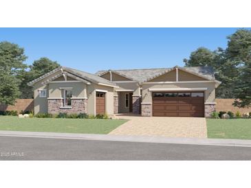 Beautiful single-story home with stone accents, desert landscaping, and a two-car garage at 25135 N 177Th Dr, Surprise, AZ 85387