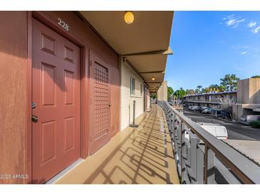 Hallway view of the apartments and the surrounding community at 6125 E Indian School Rd # 228, Scottsdale, AZ 85251